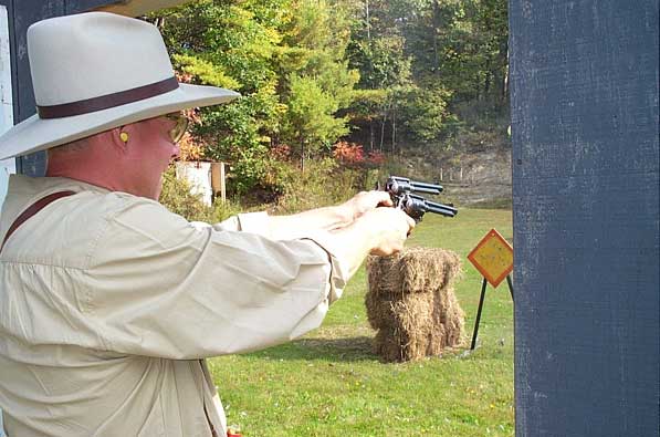 Shooting Gunfighter-style at the Outlaws Revenge Shoot in Falmouth, ME in October 2004.