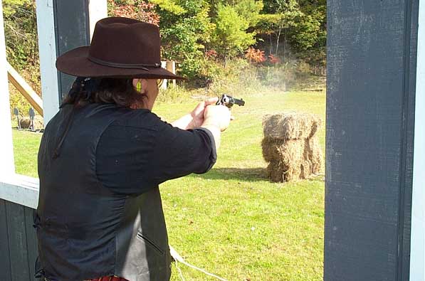 Shooting his pistol at Falmouth, ME in October 2004.