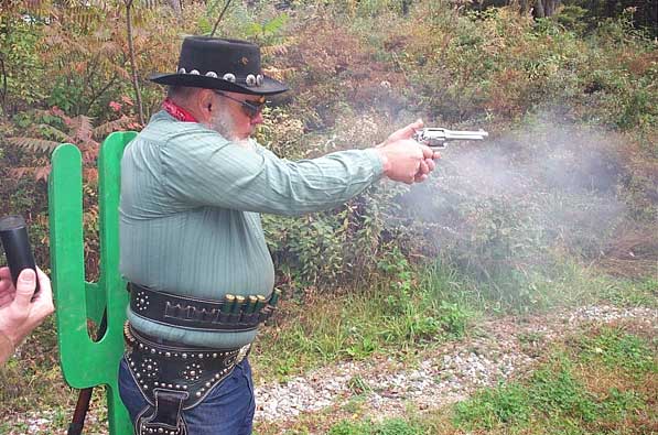 Shooting pistol during the Outlaw's Revenge Shoot at Falmouth, ME in October 2004.