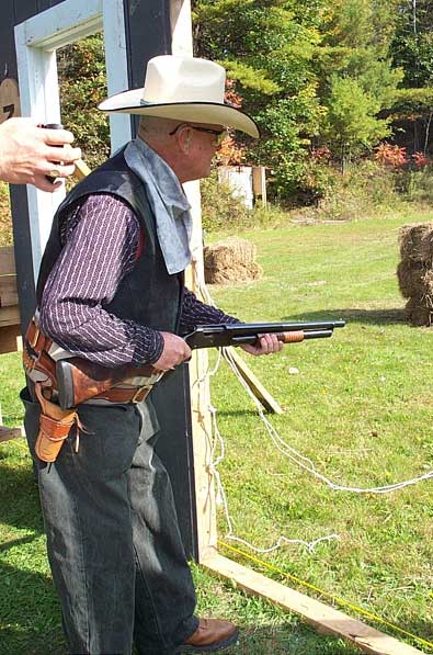 Shooting his new Coyote Cap '97 shotgun.