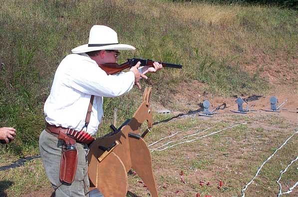 Smokey Sue shooting rifle ...