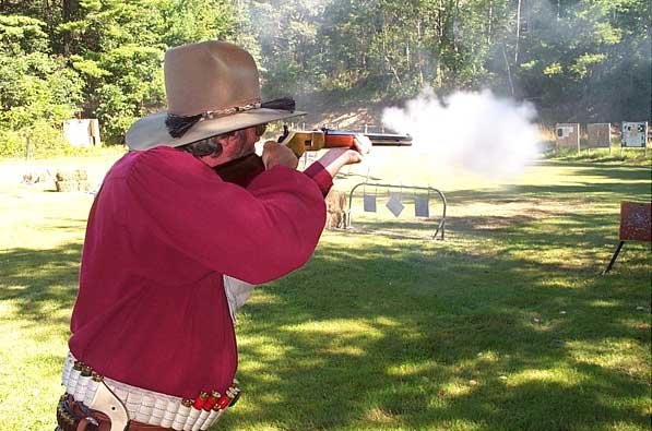 Shooting rifle at the 2004 SASS Maine State Championships.