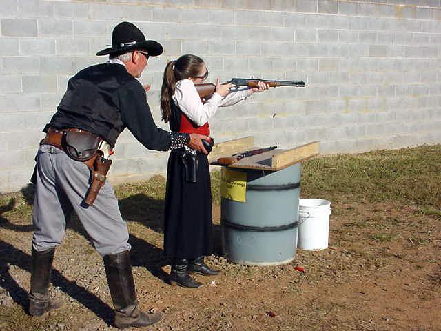 Shooting rifle while being timed by Tex, SASS #4.