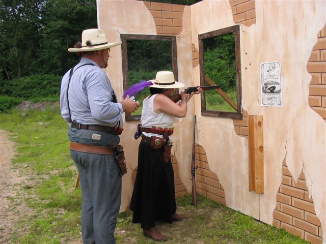 Ellie Mae shooting rifle at 2005 SASS NH State Black Powder Championship.