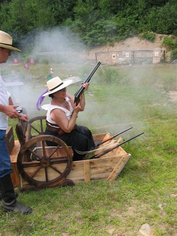 Shucking shells from her shotgun ...