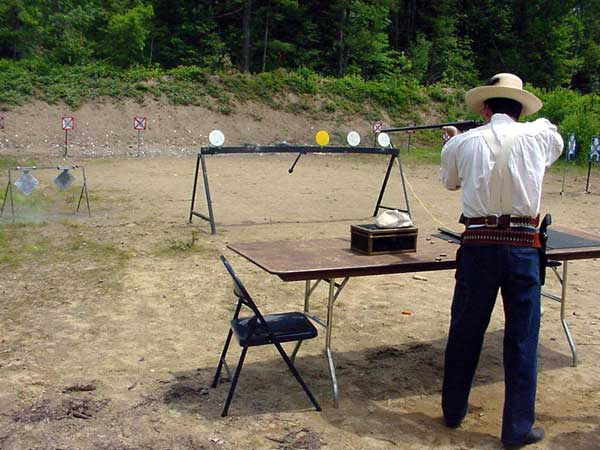 Dead Head with shotgun ... notice the lead dust fly on the right target.