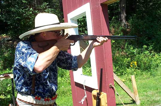 Bullseye shooting rifle at Falmouth with new shirt and hat.