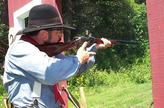 Slowhand ejecting a cartridge from his 1873 Winchester at July 2003 Shoot at Falmouth, ME.