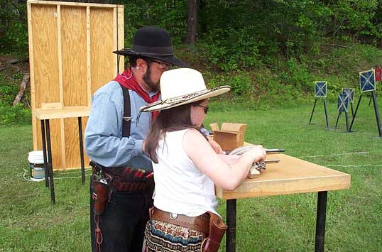 Slowhand helping his daughter, Little Britches.