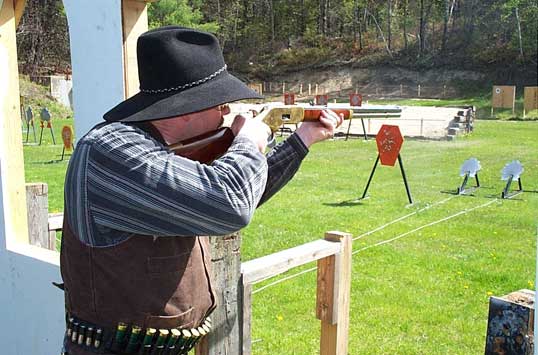 Shooting rifle at the May 2004 HVR Shoot in Falmouth.