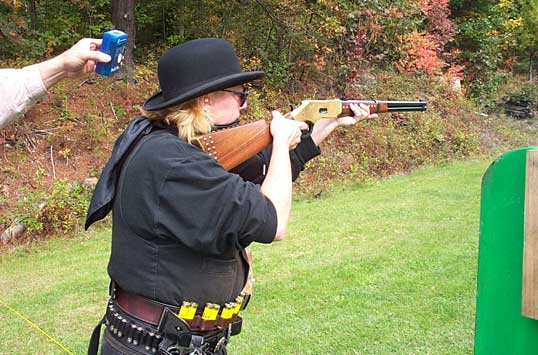 Miss Delaney Belle shooting rifle at 2003 Outlaws Revenge at Falmouth, ME.