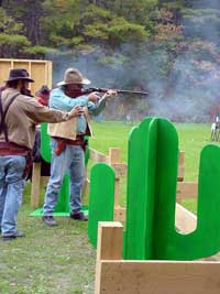 Piney Woods going to town with his rifle.