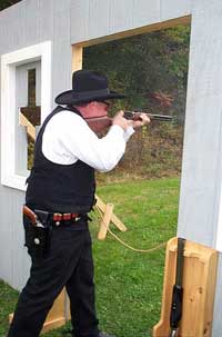 Virgil McCain in action with his rifle.