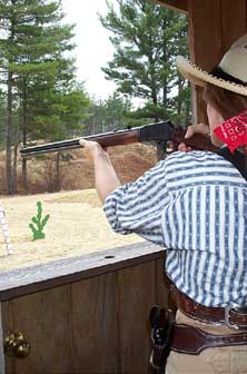 Shooting rifle at Pemi Gulch in May 2004.