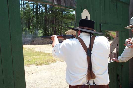 Smokey Sue working the rifle at 2003 Fracas at Pemi Gulch.