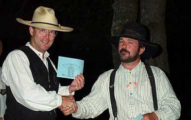 Dead Head receiving certificate for winning the Single Shot Long Range Rifle side event.