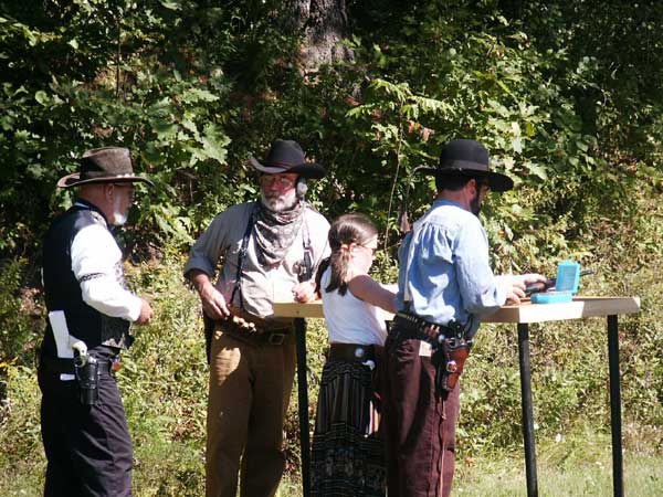 Garrett Slowhand Wade helping Little Britches at the Thunder in the Valley Shoot at Falmouth, ME in September 2002.