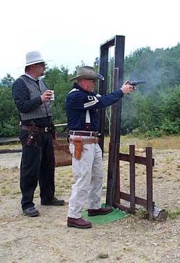 U B Mountain being timed by Jake Mountain during a pistol stage at Dalton, NH.