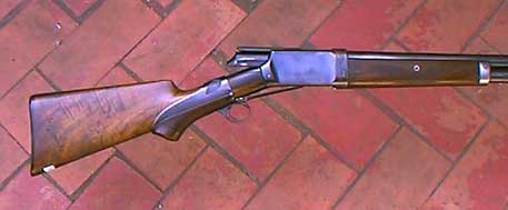 Photo of Burgess Shotgun with action open.