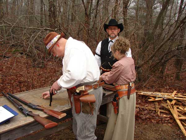 The Loading Table Officer making sure they load only the required rounds.