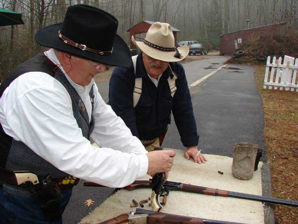 While the Unloading Officer makes sure the firearms are empty.