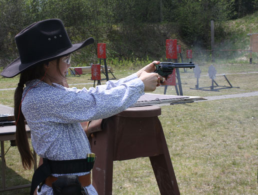 Lil Miss Sassy cocking her revolver ...