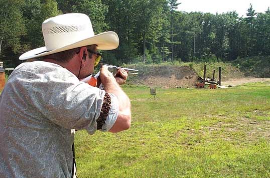 Jimmy Spurs shooting the bear in Country Pond in August 2005.