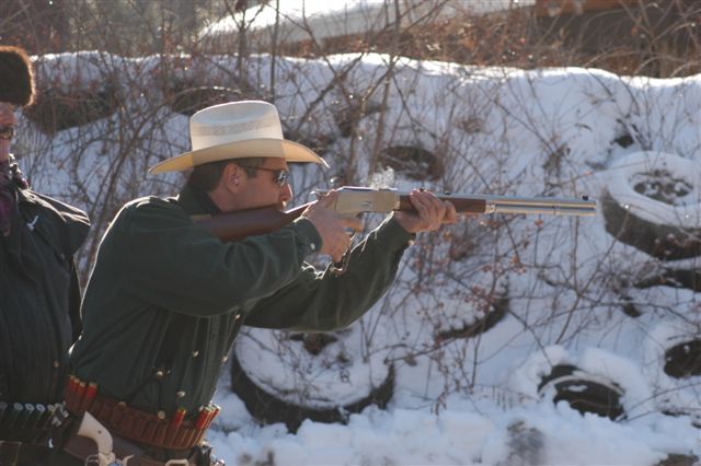 Shooting rifle in the snow.