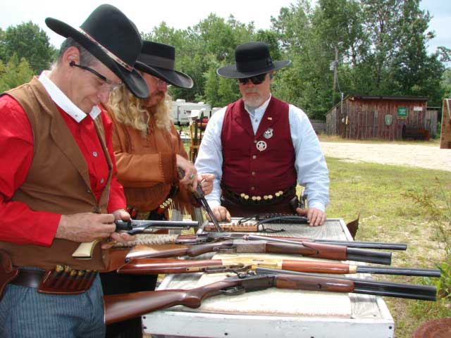 Iron Pony watching Laconia and Wild Bill Blackerby at the loading table.