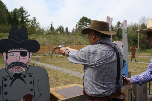 Shooting pistol at Wiscassit, ME in May 2010.