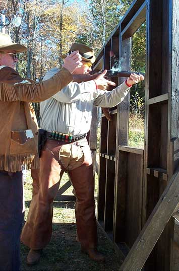 Bos'n Bart shooting rifle at Country Pond in November 2002.