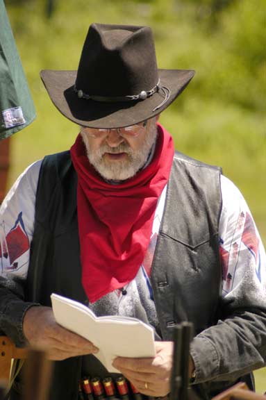 Sled Dog Man reading the scenario.