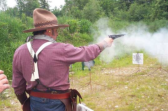 The Lazarus Man shooting pistol at the Flap Jack Gap Cowboy Shootout.