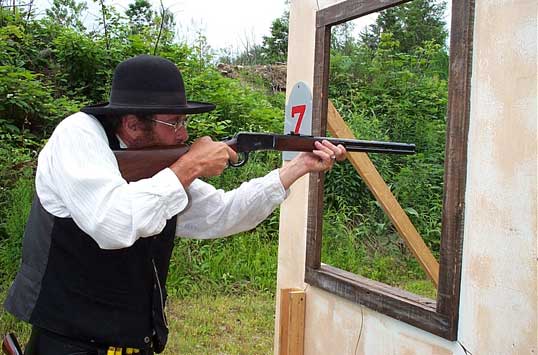 Preacher Rick communicating with some rustlers.