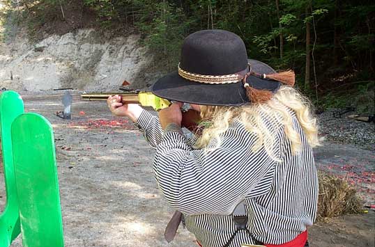 Aiming that nice 1866 Winchester at 2003 SASS Maine State Championships.
