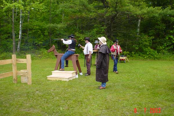 Ida Mae Holliday shooting from the horse with Smokey Sue timing her.