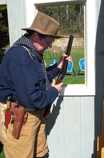 Shootist Bill shucking shotgun shells.