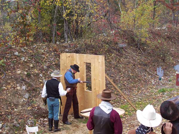 Reloading his 1897 shotgun.