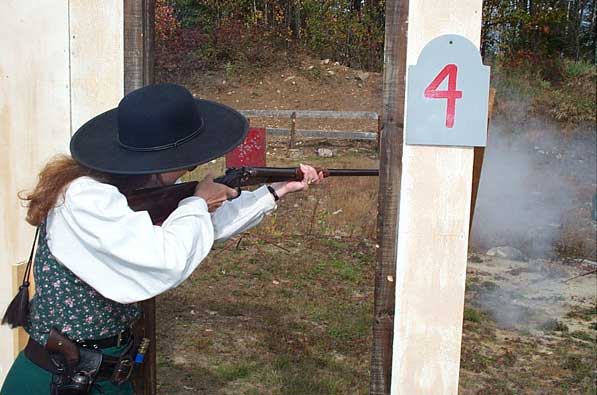 Lou Graham blasting with her shotgun ...