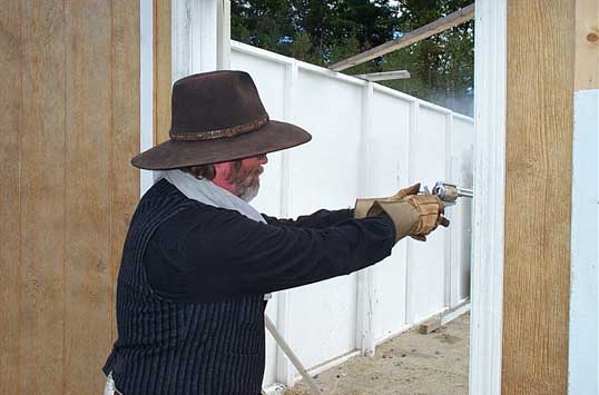 Shooting pistol at Harvard, MA in October 2003.