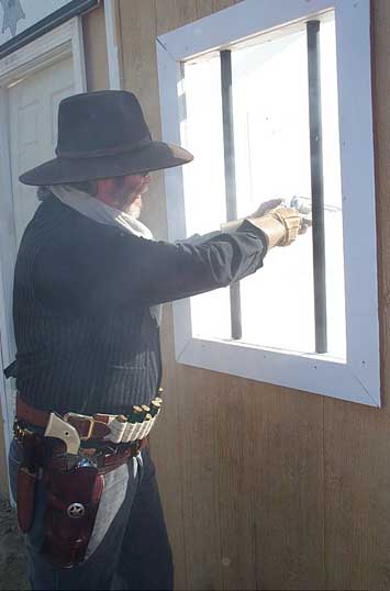 Shooting pistol at Harvard, MA in October 2003.