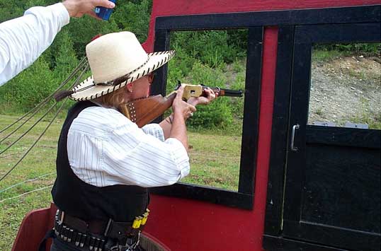 Working the action on her 1866 Winchester at the 2003 NH State SASS Championships.