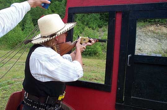Working the action on her 1866 Winchester at the 2003 NH State SASS Championships.