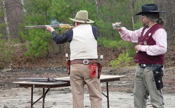 Grizz Henry in action with his rifle.