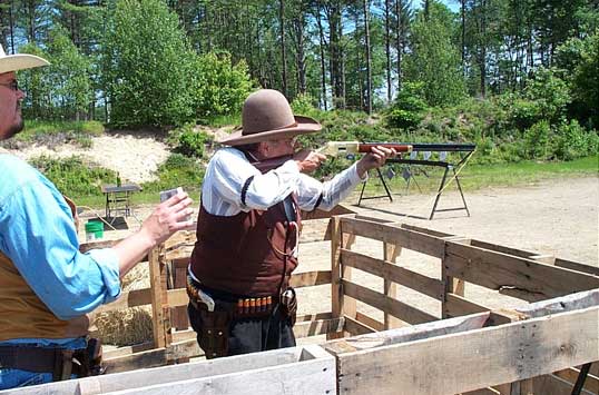 Saguaro Jack shooting rifle as part of another clean shoot. (Pelham, June 2003).