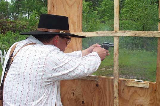 Shooting pistol in Pelham, NH in May 2004.