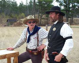 Grizz Henry talking with Preacher Rick at Pemi Gulch in May 2004.