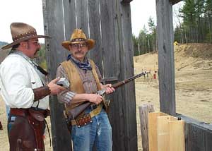 Owl Hoot talking with Range Officer.