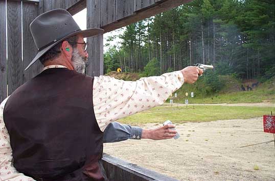 Shooting his pocket pistol at Pemi Gulch.