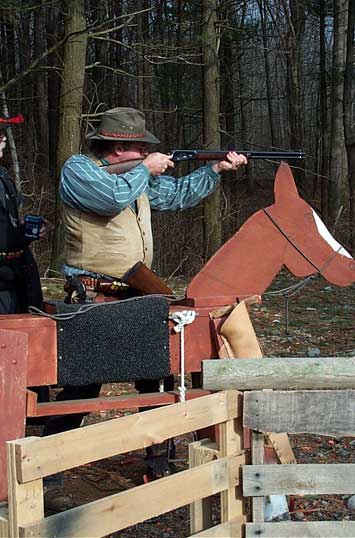 Capt. Morgan Rum with rifle at Scituate, MA Spring Shoot.